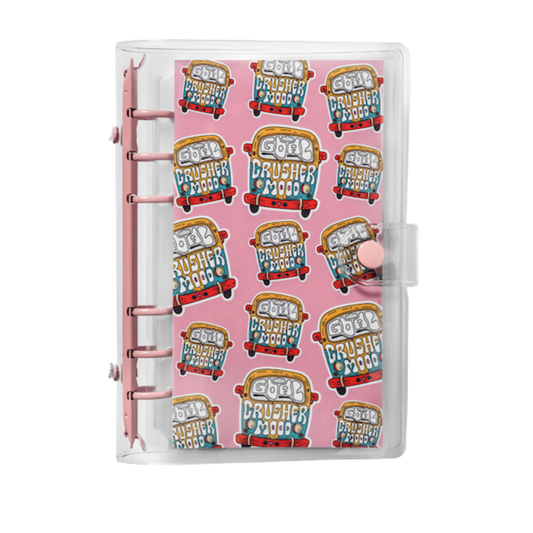Planner cover with cartoon bus design on a pink background